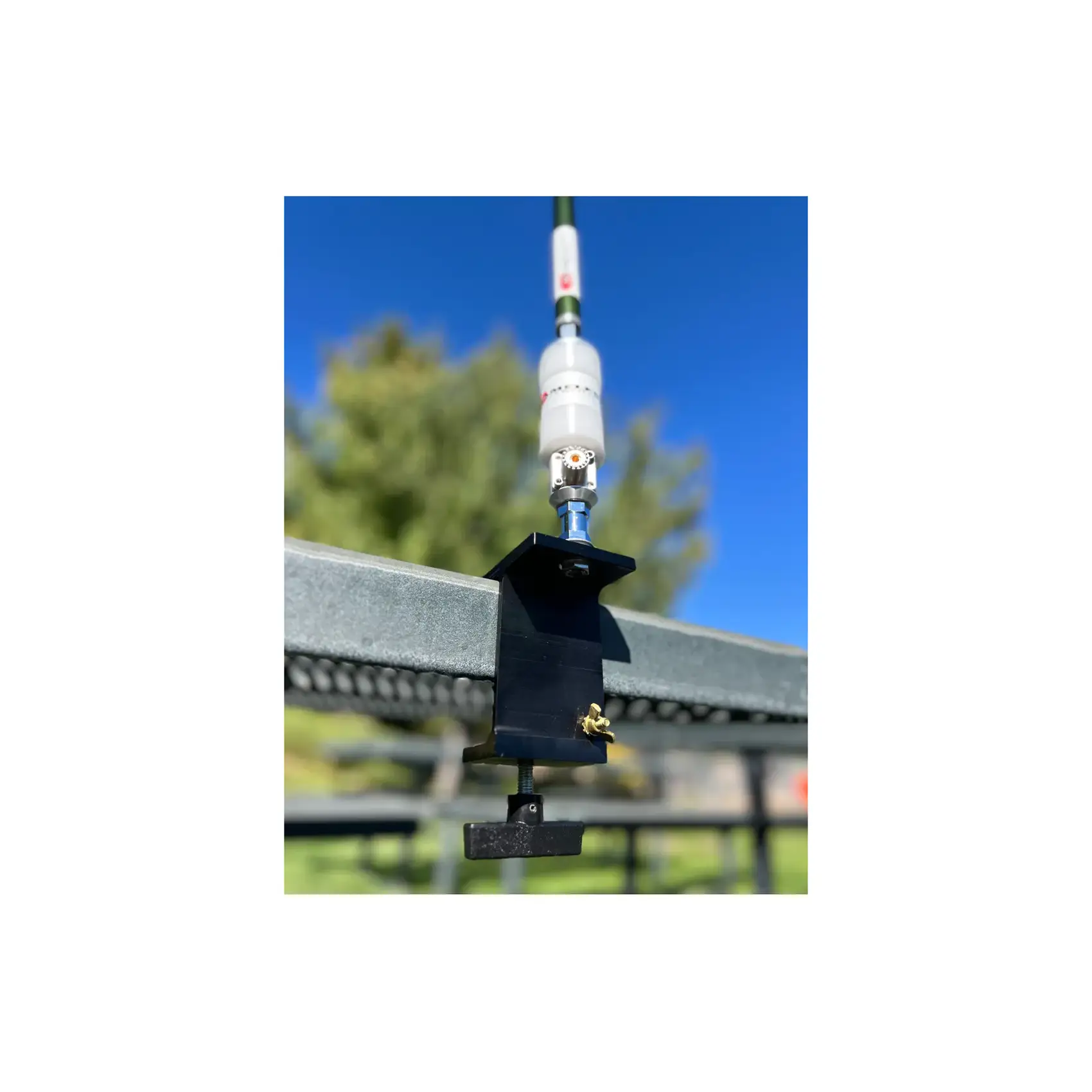 Chameleon Antenna: CHA UCM Universal Clamp Mount in use with antenna mounted on it
