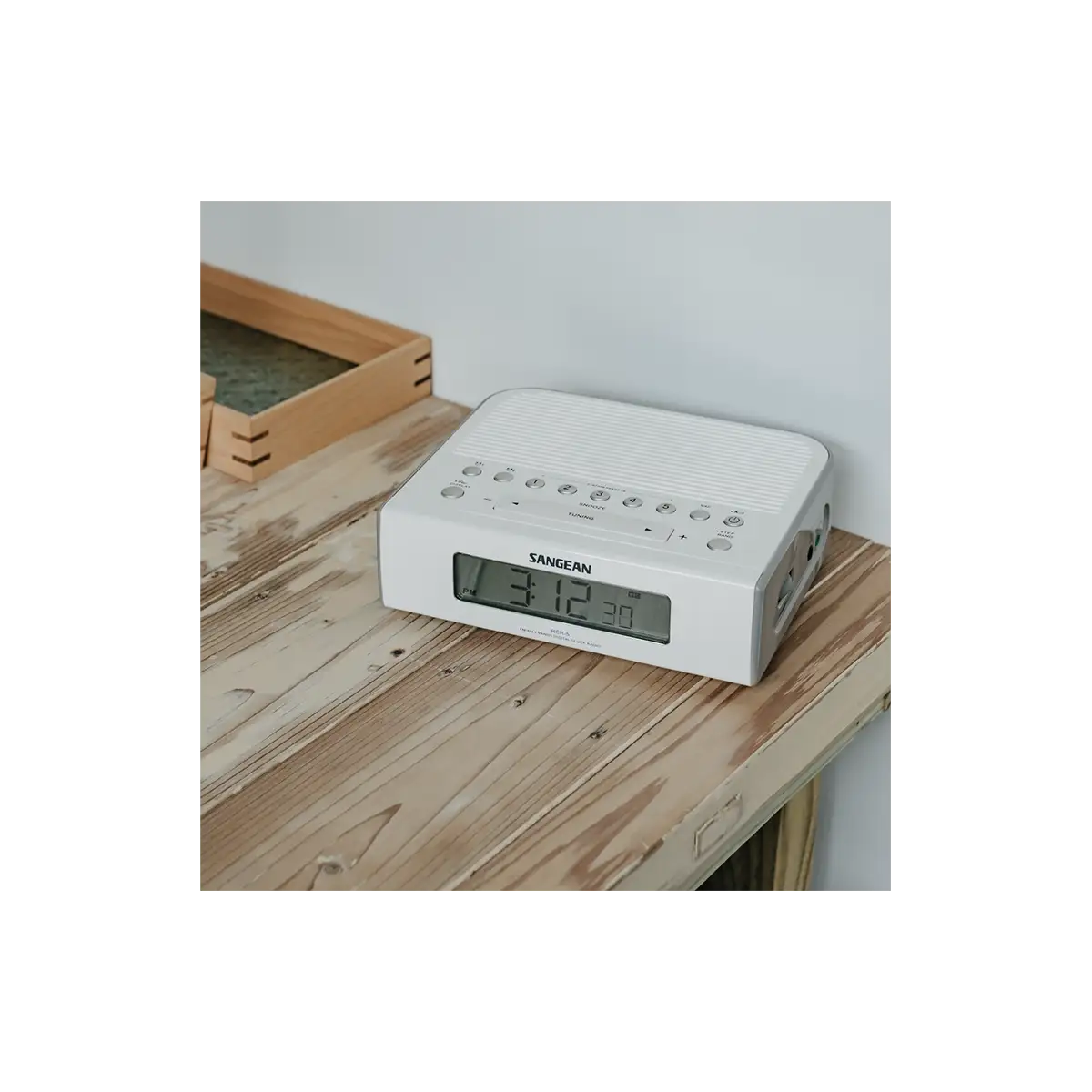 Sangean RCR-5 AM/FM Digital Tuning Radio in white sitting on desk